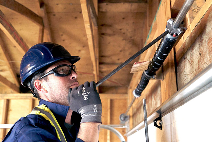 how to remove a garage door spring